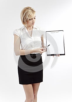 Office woman showing blank clipboard