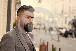 Office worker. Bearded man going to work. Hipster in business style on street. Business man in modern city. Professional