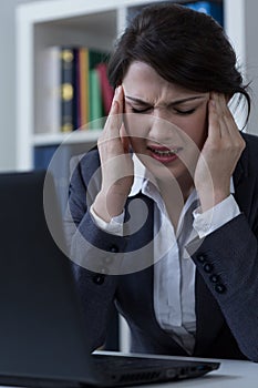 Office worker with cephalalgia