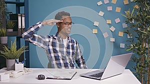 Office worker doing military salute to show respect and patriotism