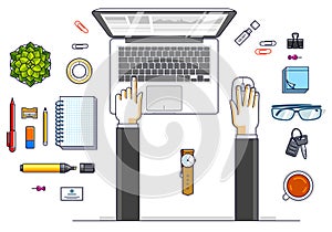 Office worker or entrepreneur working on a laptop computer, top view of workspace desk with human hands and diverse stationery