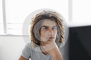 Office Worker Looking At Computer Monitor