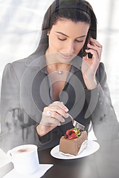 Office worker on phone call in cafe