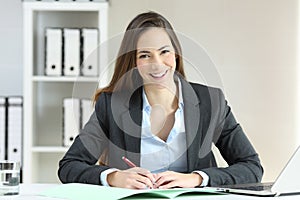 Office worker posing looking at camera