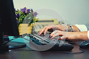 The office worker prints on the keyboard