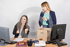 Office worker rejoices that dismissed colleague collects things