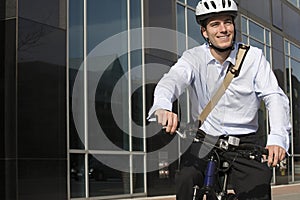 Office worker riding bicycle