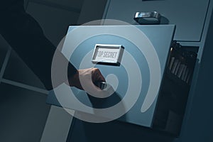 Office worker searching confidential information