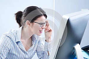 Office worker staring at computer screen