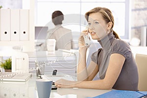 Office worker talking on phone