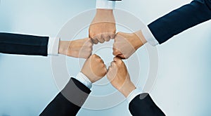 Office worker team stacking hand together symbolize successful teamwork. Shrewd