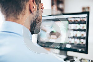 Office worker tired from looking at the monitor