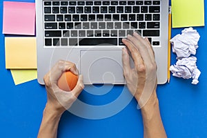 Office worker typing email on computer