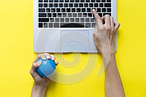 Office worker typing email on computer