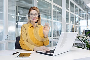 Office worker works remotely, online customer support service, help service, woman uses headset and laptop for online