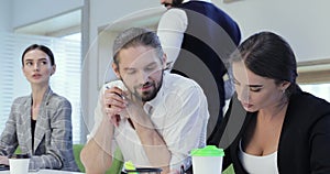 Office Workers. Business Man And Woman Working Indoors