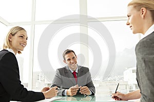 Office workers at a business meeting