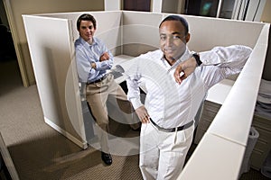 Office workers in cubicle