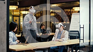 Office workers testing VR headset together