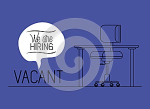 Office workplace with we are hiring message