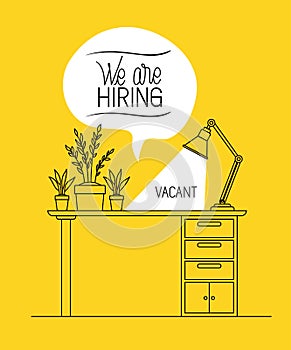 Office workplace with we are hiring message