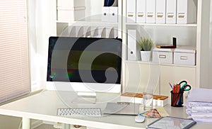 Office workplace with laptop and smart phone on wood table