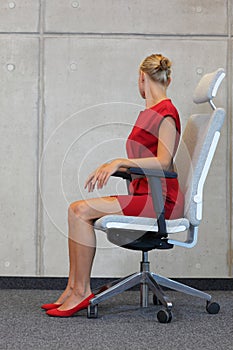 Office yoga, relax on chair - business woman exercising