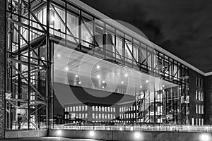 Officebuilding in Zoetermeer, Netherlands with a beautiful architecture by night in black and white