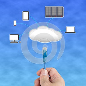 Officeman hold Network cable connect to cloud computing server