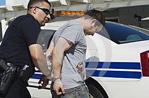 Officer Arresting Drug Dealer