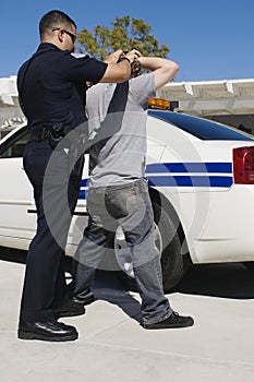 Officer Arresting Young Man