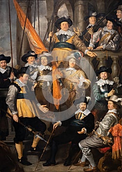 Officers and other militiamen of the XVIII district in Amsterdam, led by captain Albert Bas and lieutenant Lucas Conijn, painting