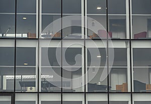 Offices in glass building in Pilsen city in wet rainy cloudy day