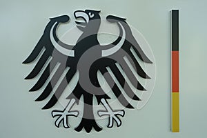 Official Bundeswappen, Bundesadler of Germany with symbolized Bundesflagge photo