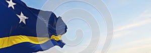 official flag of Curacao at cloudy sky background on sunset, panoramic view. patriot and travel concept. copy space for wide