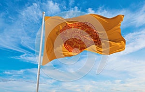 official flag of Dharmacakra Thailand at cloudy sky background on sunset, panoramic view. Thai travel and patriot concept. copy