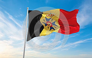 official flag of Pro Belgica , Belgium at cloudy sky background on sunset, panoramic view. Belgian travel and patriot concept. photo