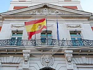 Official flag of Spain on the governmental building in Madrid, Spanish capital