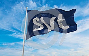 official flag of SVT, Sweden at cloudy sky background on sunset, panoramic view. Swedish travel and patriot concept. copy space