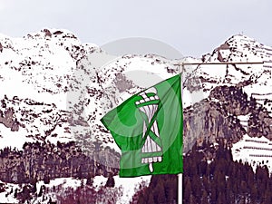 The official flag of the Swiss canton of St. Gallen or die offizielle Flagge des Schweizer Kantons St. Gallen, Amden - Switzerland