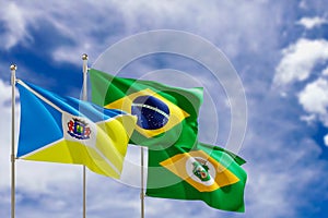 Official flags of the country Brazil, state of Ceara and city of Juazeiro do Norte. Swaying in the wind under the blue sky. 3d