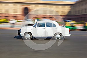 Official Hindustan Ambassador car driving outside North Block, S photo