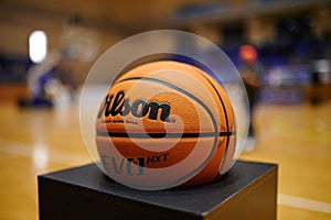 Official match ball of Ukrainian Super league. Basketball ball on the court in sport arena