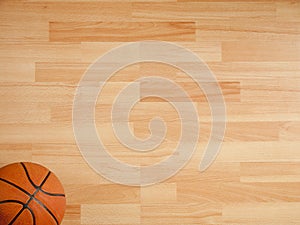 An official orange ball on a basketball court photo