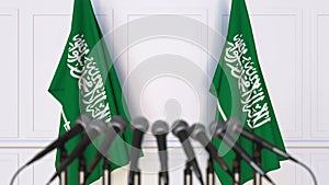 Official press conference. Flags of Saudi Arabia and microphones. Conceptual 3D rendering