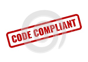 Official red rubber stamp signifying a code compliant status for regulatory standards