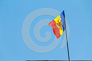 The official state flag of the Republic of Moldova. Background with copy space