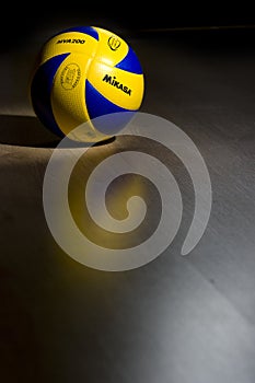 Official volleyball on hardwood floor