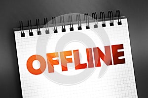 Offline - means that the device and its user are disconnected from the global internet, text on notepad, concept background