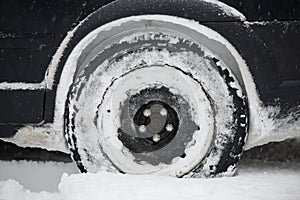 offroad car tires stuck in the snow